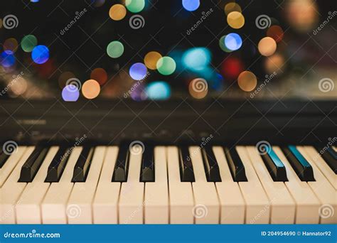 Christmas Illuminations And Piano Keyboard Stock Photo Image Of