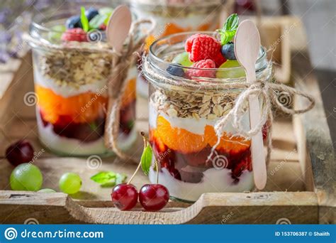 Homemade Granola In Jar With Yoghurt And Fresh Berries Stock Image