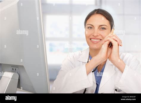 Mixed Race Doctor Working In Hospital Stock Photo Alamy