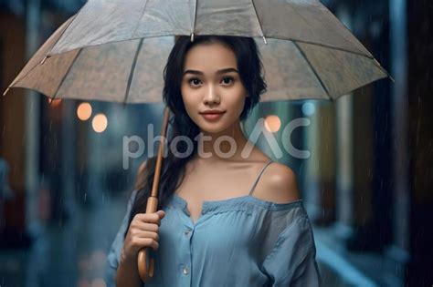 雨の中傘をさす外国人女性7 No 26977027｜写真素材なら「写真ac」無料（フリー）ダウンロードok