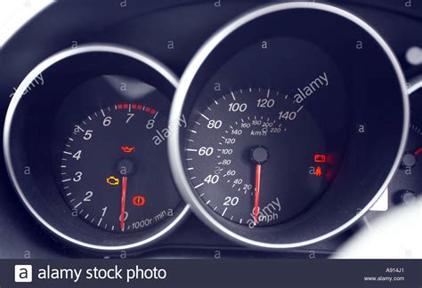 A car speedometer and rev counter Stock Photo - Alamy