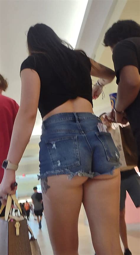 Jiggily Brunette Ass Cheeks Hanging Out Of Jean Shorts Short Shorts