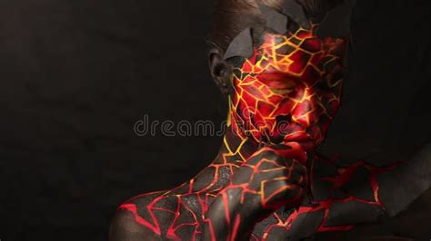 Brunette Girl With Bodypainting On The Body In The Form Of Frozen Lava