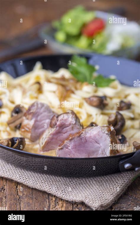 Swabian Roasted Pork Fillet With Spaetzle Stock Photo Alamy