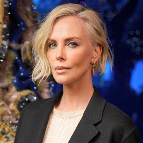 Charlize Theron Wows With See Through Dress And Hair Transformation For