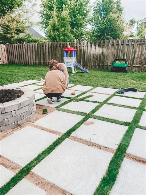 DIY Patio with Grass Between Pavers and Fire Pit