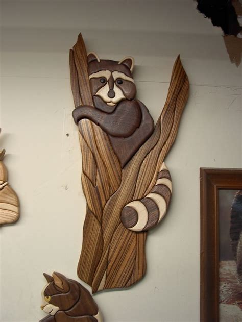 Intarsia Wood Carvings Of Raccoons And Bear