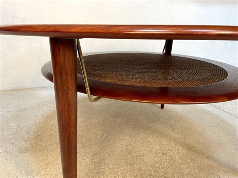 Round Minerva Fd Teak Coffee Table With Cane Shelf By Peter Hvidt