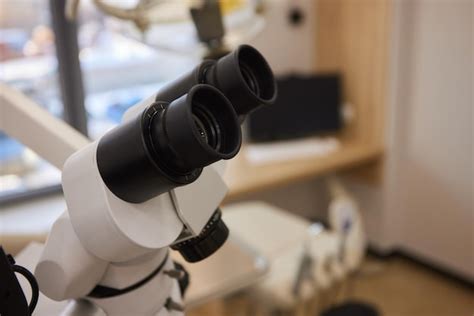 Premium Photo Dental Microscope On The Background Of Modern Dentistry