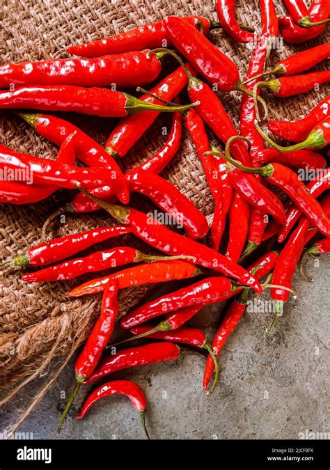 Fresh Red Chili Peppers On Vintage Cloth Background Fresh Red Chilli