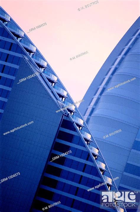 Jumeirah Beach hotel and Burj Al Arab hotel in Dubai, UAE, Stock Photo ...