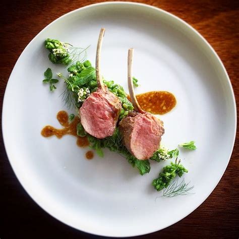 Lamb Rack Seasoned With Rosemary And Garlic Served With Its Jus And A