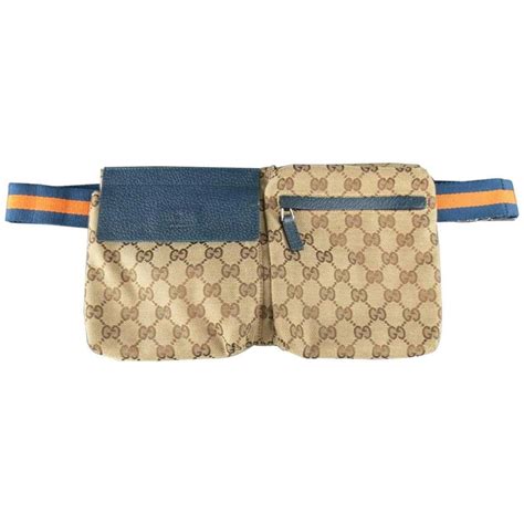 Gucci Beige Guccissima Monogram Canvas Orange And Navy Strap Fanny Pack