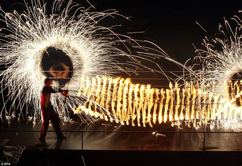 Some like it hot: Artists perform dazzling array of flaming tricks at ...