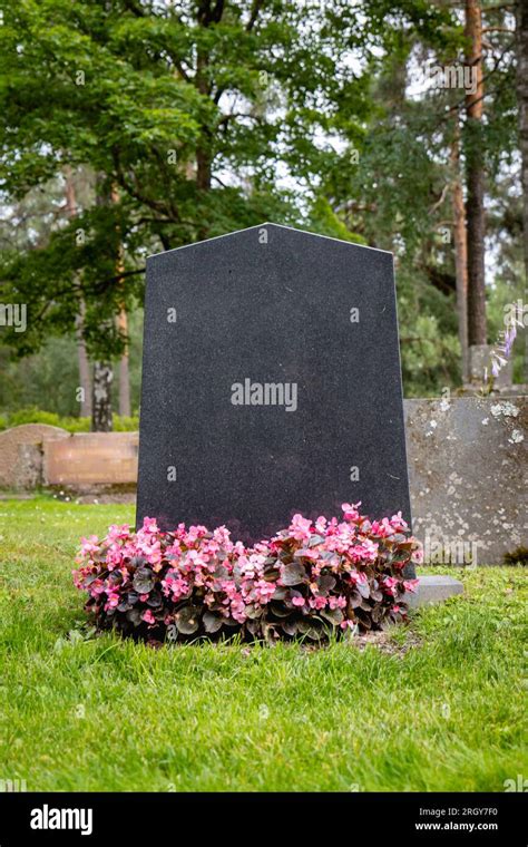 Blank Tombstone With Flowers
