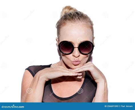 She Gets Away With It Portrait Of An Attractive Young Woman With Sunglasses Posing Playfully In