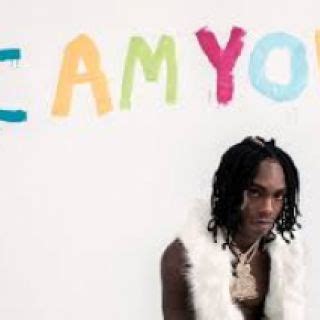 The trench coat worn by YNW Melly for his interview Verified Genius ...