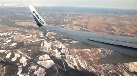 Landing at Calgary Airport (YYC) on WestJet 737 - YouTube