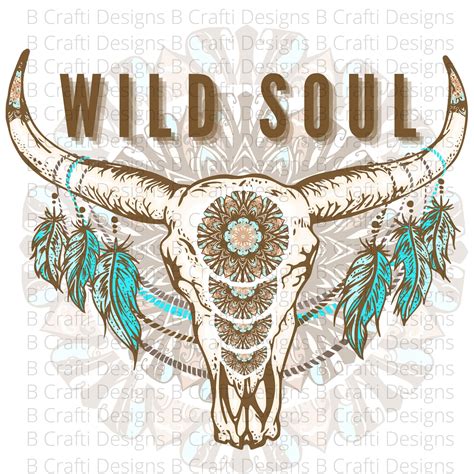 A Bull Skull With Feathers On It S Head And The Words Wild Soul Above It