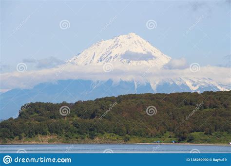 Koryaksky Volcano Rises Above The Coastline Of The Kamchatka Peninsula