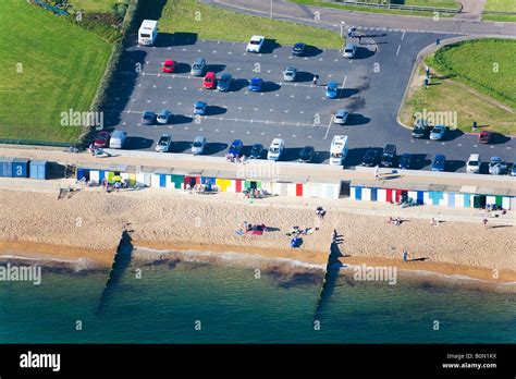 Aerial View Of Car Park Beach Huts And People On The Beach Milford On