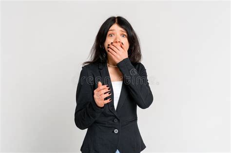 Anxious Brunette Teen Girl Screaming Look I Panic Holding Hand Near Mouth And Stare Nervous