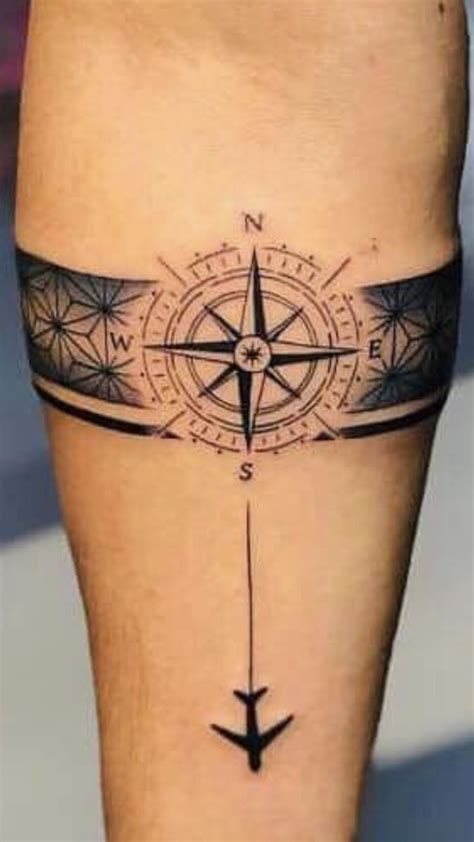 Compass Tattoo On Leg With Arrow