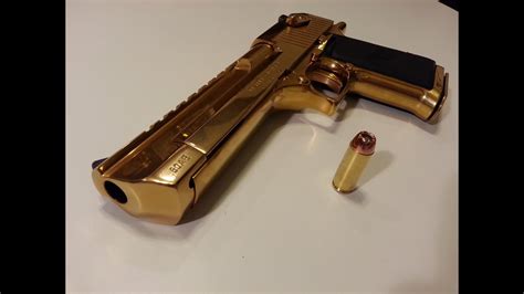 Shooting the GOLD Desert eagle .50AE - YouTube