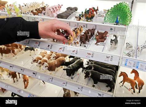 Schleich animals toys, plastic figurines in a display stand in a german ...