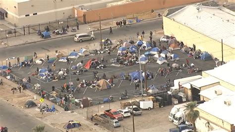 Crews work to clean up homeless encampment near downtown Phoenix | FOX ...