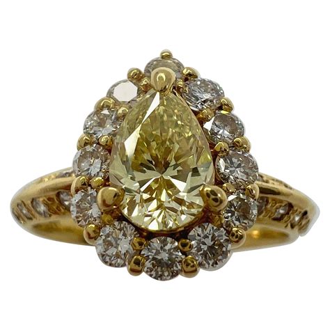 Natural Fancy Yellow Diamond Pear Cut K Yellow Gold Cocktail Cluster