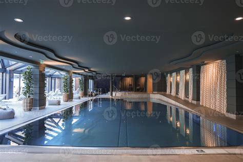 Swimming pool located in center luxury hotel room 22896810 Stock Photo at Vecteezy