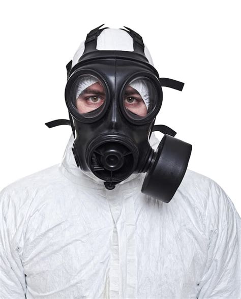 Premium Photo Portrait Of Man Wearing Gas Mask Against White Background