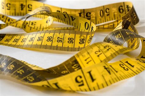 Premium Photo Yellow Measuring Tape