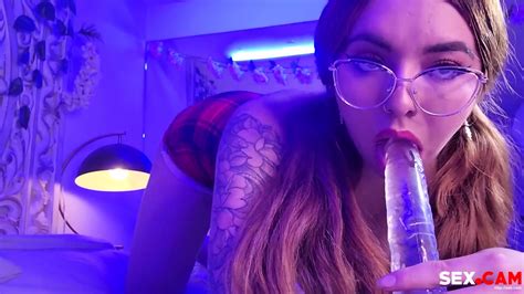 College Slut With Glasses Is Sucking A Transparent Dildo