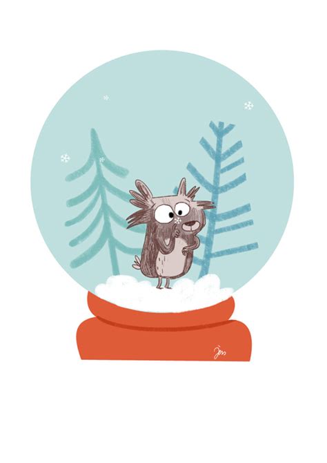 an owl sitting on top of a snow globe