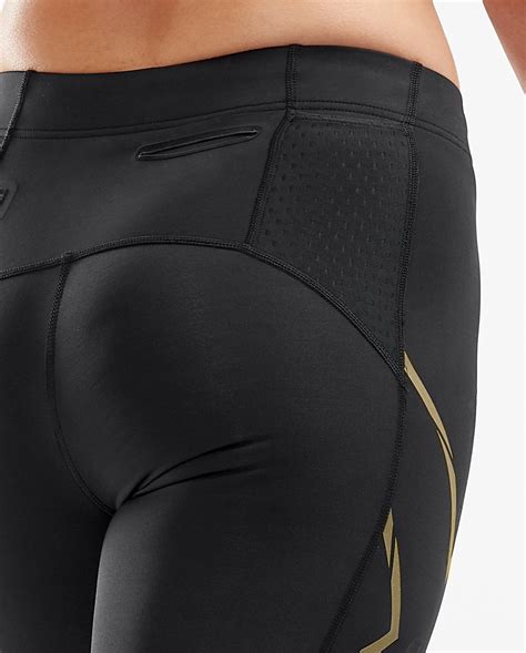 Xu Women S Mcs Run Compression Tights Black Gold Reflective