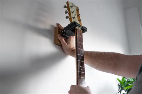 How To Hang Your Guitars On The Wall Properly