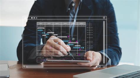 Project Manager Working With Gantt Chart Schedule To Plan Tasks And