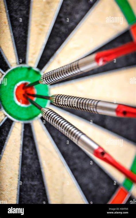 Three Darts In Bull S Eye Close Up Stock Photo Alamy