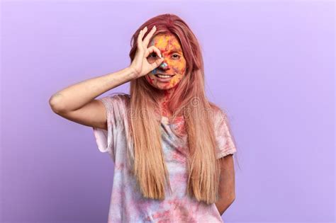 Crazy Blonde Girl Making A Hole With Fingers And Looking Through It