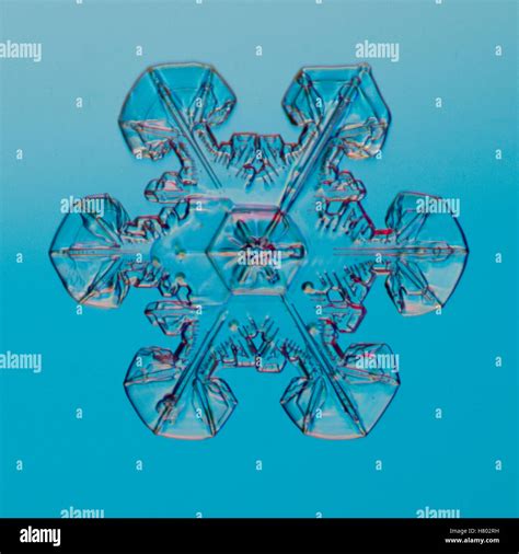 Snowflake Seen Through Microscope Stock Photo Alamy