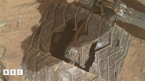 Curiosity Nasa Reveals Large Hole In Wheel Of Its Mars Rover Bbc