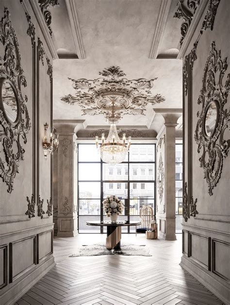 An Ornately Decorated Lobby With Chandelier And Marble Floors