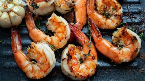 Why You Should Think Twice Before Putting Peeled Shrimp On The Grill