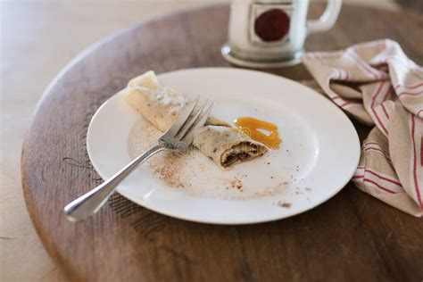 Half Eaten Pancake With Syrup On White Plate Stock Image Image Of