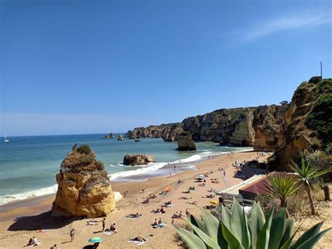 From Lisbon Day Trip To Algarve Benagil Carvoeiro Lagos Getyourguide