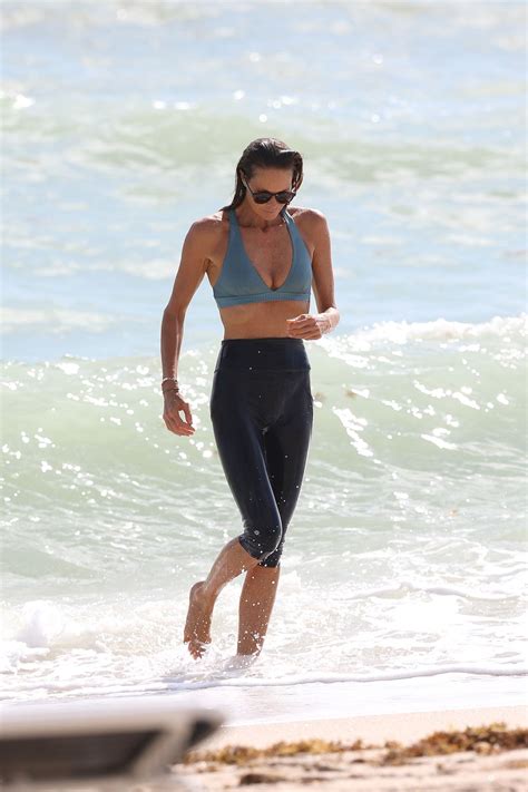 ELLE MACPHERSON In Bikini Top And Leggings At A Beach In Miami 10 13