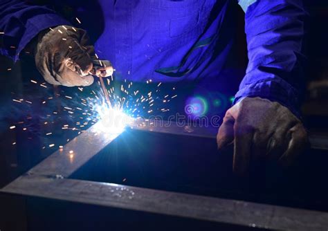 Two Welder Is Assembling The Workpiece By Process Shielded Metal Arc