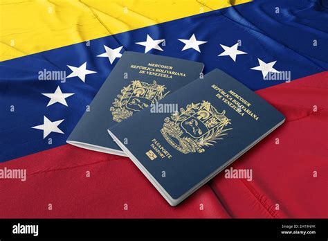 Venezuela passport with the flag of Venezuela Stock Photo - Alamy